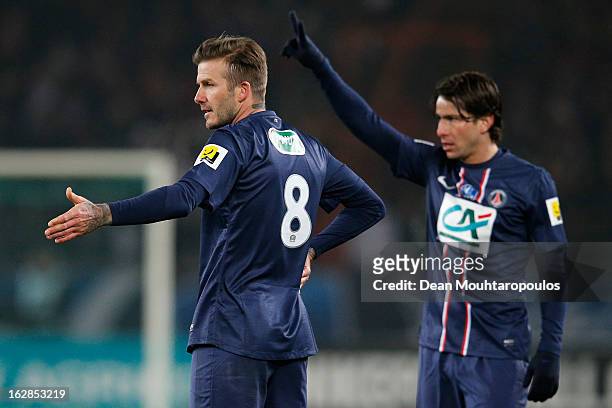 David Beckham and Maxwell of PSG signal before taking a free kick during the French Cup match between Paris Saint-Germain FC and Marseille Olympic OM...