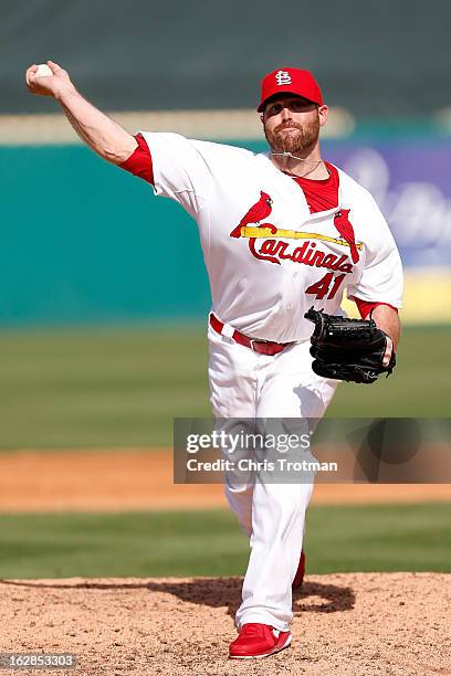 Mitchell Boggs of the St. Louis Cardinals throws a pitch during a game against the Miami Marlins at the Roger Dean Stadium on February 28, 2013 in...