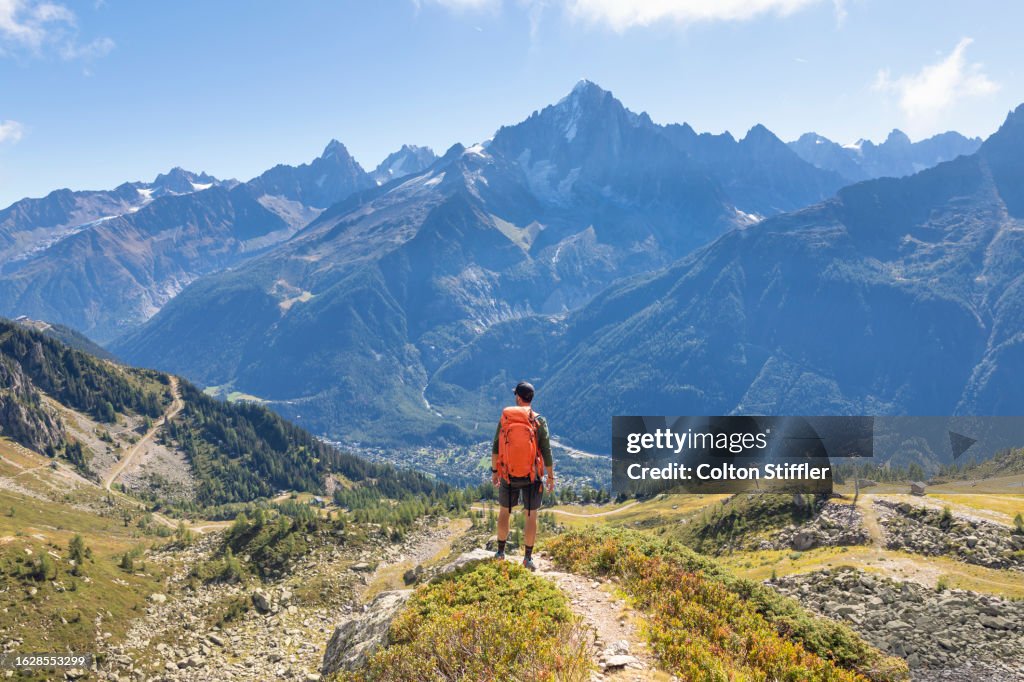 A Man Hiking in the French Alps