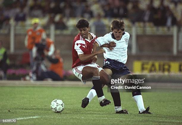Tarik Soliman of Egypt battles with Peter Beardsley of England during the World Cup match in Cagliari, Italy. England won the match 1-0. \ Mandatory...