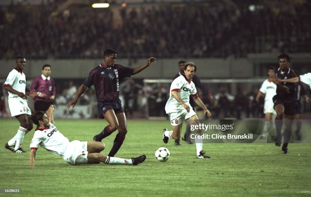 Patrick Kluivert of Ajax and Franco Baresi of AC Milan