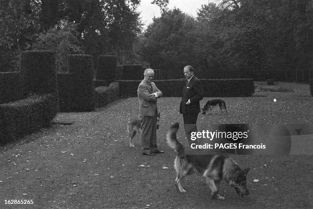 British American petrol-industrialist J. Paul Getty with his friend, business colleague and security adviser, Jack Forrester, at his Sutton Place...