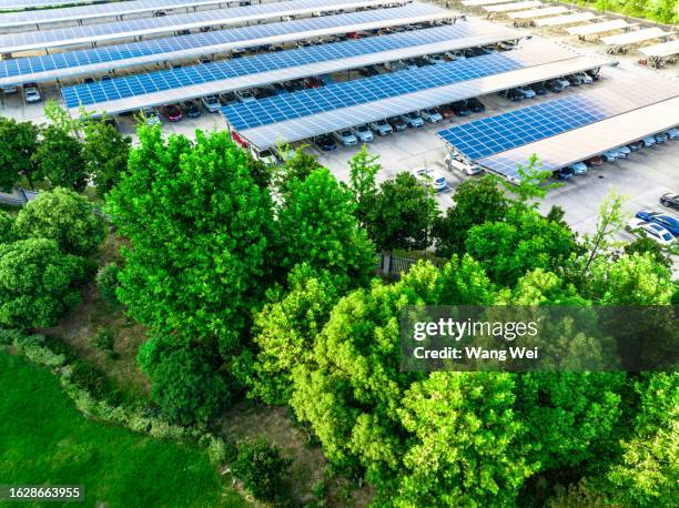 green solar parking - wang wei stock pictures, royalty-free photos & images