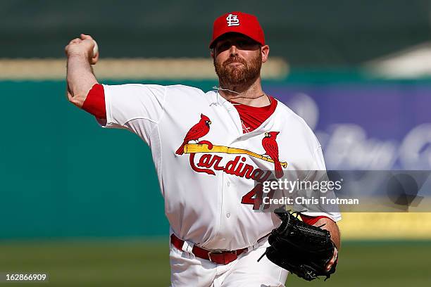 Mitchell Boggs of the St. Louis Cardinals throws a pitch during a game against the Miami Marlins at the Roger Dean Stadium on February 28, 2013 in...