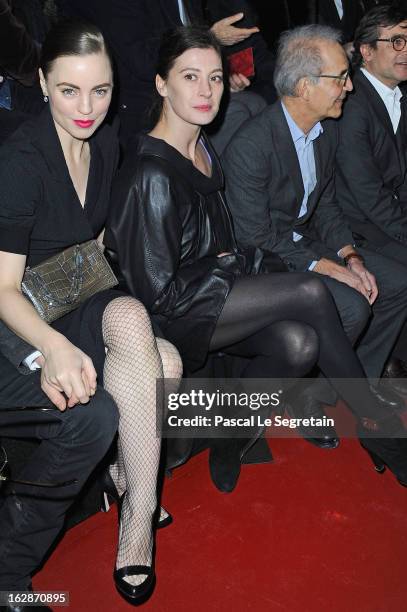 Actress Melissa George and star dancer Marie-Agnes Gillot attend the Nina Ricci Fall/Winter 2013 Ready-to-Wear show as part of Paris Fashion Week on...