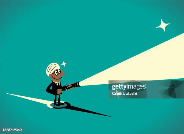 a businessman standing on a compass lights the way ahead with a flashlight - turban vector stock illustrations