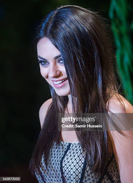 Mila Kunis arrives for the "Oz: The Great And Powerful" European premiere at the Empire Leicester Square on February 28, 2013 in London, England.