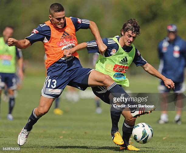 Marco Rojas and Diogo Ferreira of the Victory compete for the ball during a Melbourne Victory A-League training session at Gosch's Paddock on March...