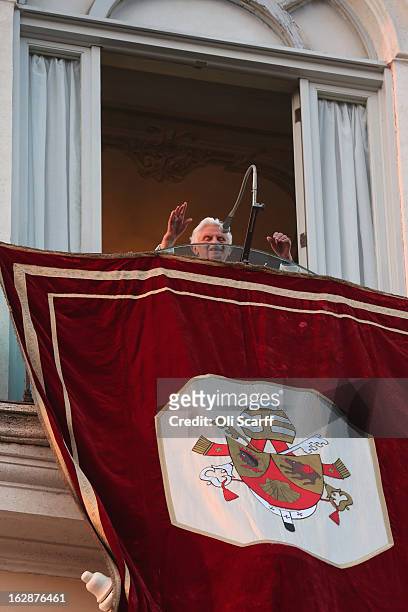 Pope Benedict XVI walks away for the last time as head of the Catholic Church, from the window of Castel Gandolfo where he will start his retirement...