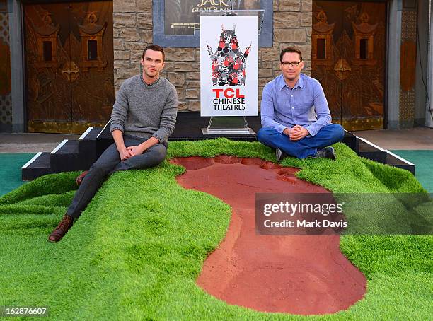 Actor Nicholas Hoult and director Bryan Singer attend the "Jack The Giant Slayer" footprint ceremony held at the TCL Chinese Theatre on February 28,...