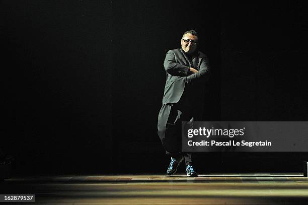 Fashion designer Alber Elbaz acknowledges applause following the Lanvin Fall/Winter 2013 Ready-to-Wear show as part of Paris Fashion Week on February...