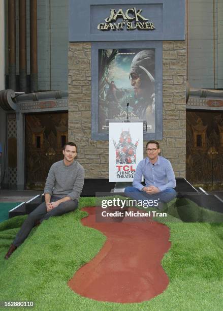 Nicholas Hoult and Bryan Singer attend the "Jack The Giant Slayer" giant footprint ceremony held at the TCL Chinese Theater on February 28, 2013 in...