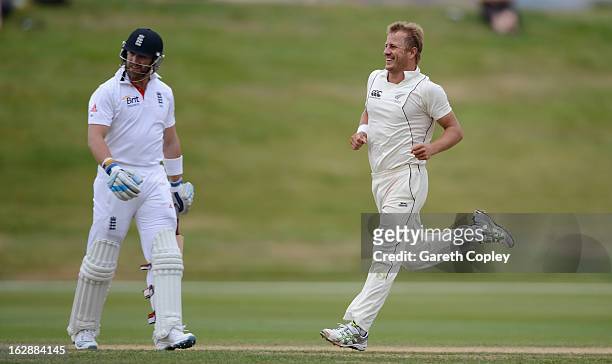 Neil Wagner of a New Zealand XI celebrates dismissing Matt Prior of England during day three of the International Tour Match between the New Zealand...