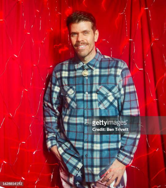 Perez Hilton poses for the 2022 Jingle Ball x PEOPLE Portrait Studio on December 2, 2022 in Los Angeles, CA.
