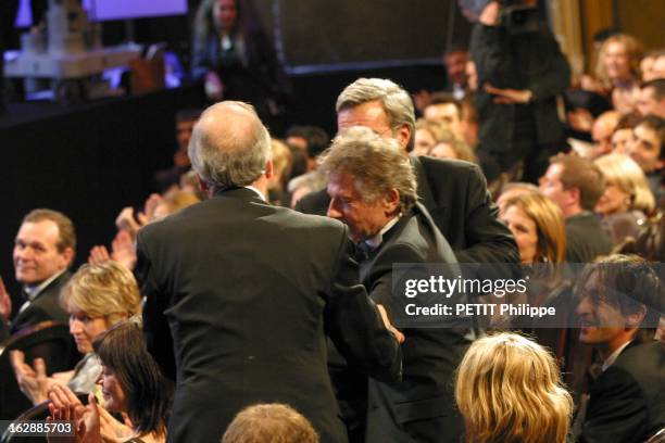 The Awards. La 28ème cérémonie des CESAR 2003 au théâtre du Châtelet à PARIS : Roman POLANSKI, Alain SARDE, Robert BENMUSSA se levant pour aller...