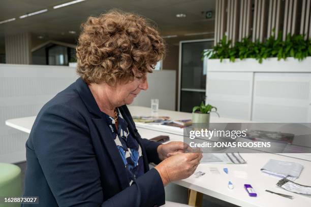 Vice-prime minister Petra De Sutter performs a blood test during a press moment in the context of the blood tests for PFAS, in Brussels, Monday 28...