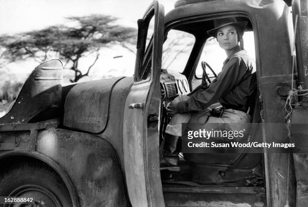 Italian actress Elsa Martinelli sits in a truck during the filming of 'Hatari!' , Tanzania, 1962.