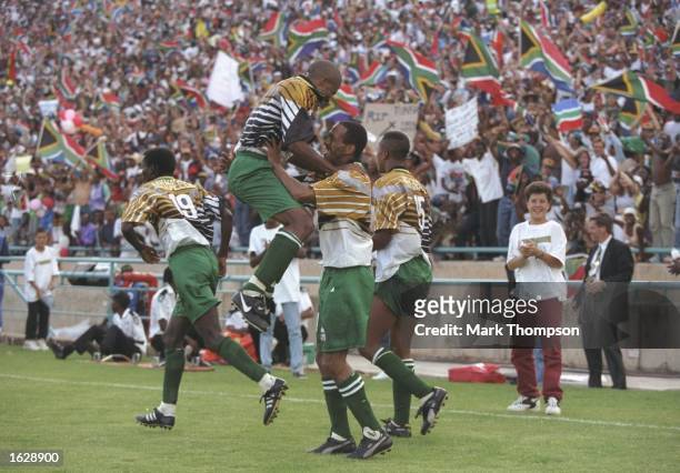 South African players celebrate a goal during the African Nations Cup Final against Tunisia in South Africa. South Africa won the match 2-0. \...