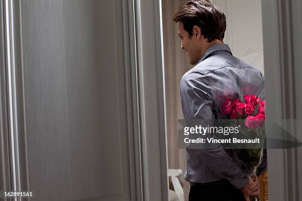 romantic surprise - man flower shirt fotografías e imágenes de stock