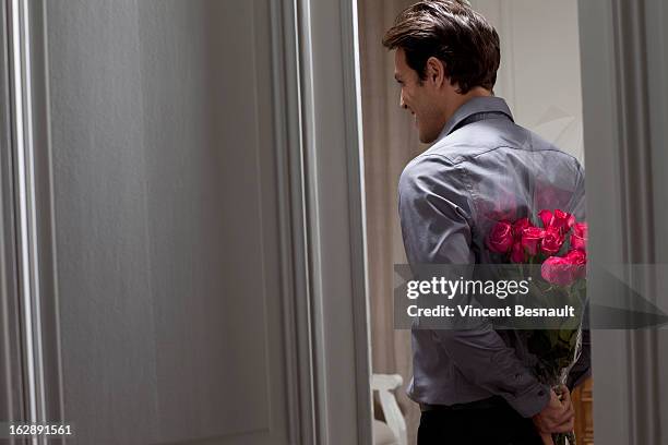 romantic surprise - hands behind back stock pictures, royalty-free photos & images