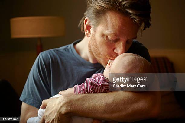 dad with baby - father baby stock pictures, royalty-free photos & images