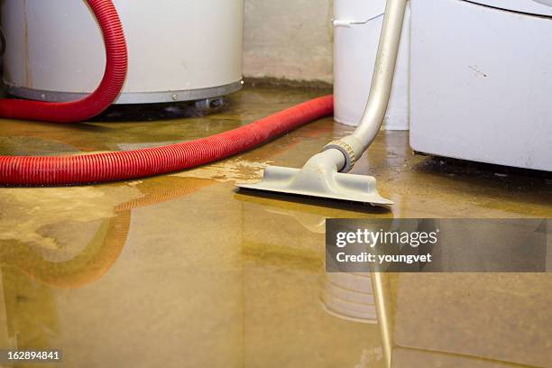 flooded basement cleanup - flooded basement stock pictures, royalty-free photos & images