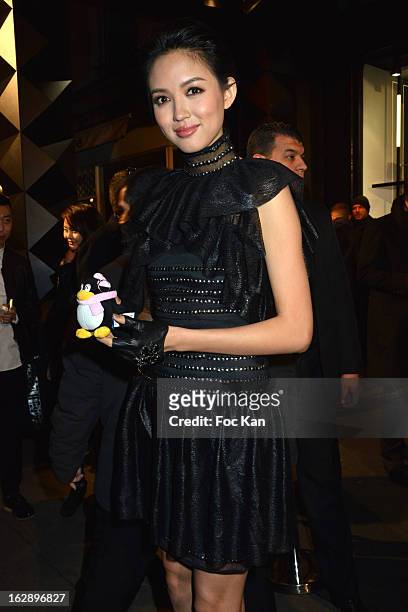 Miss World 2007 Zhang Zilin attends the opening of the Karl Lagerfeld concept store during Paris Fashion Week Fall/Winter 2013 at Karl Lagerfeld...