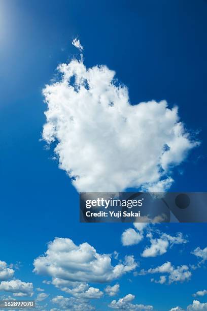 clouds forming heart in sky - cloud shape stock pictures, royalty-free photos & images