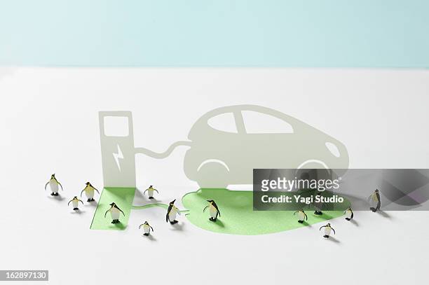 electric car and electric stand - japan penguin bildbanksfoton och bilder