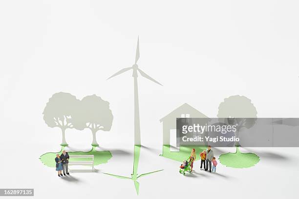 wind turbine and house made ??of paper - figurine ストックフォトと画像