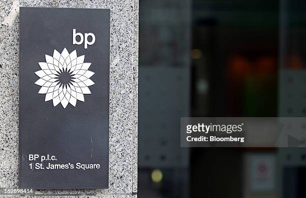 The BP Plc company logo sits on a sign outside the company's headquarters in St. James's Square in London, U.K., on Thursday, Feb. 28, 2013. BP Plc's...
