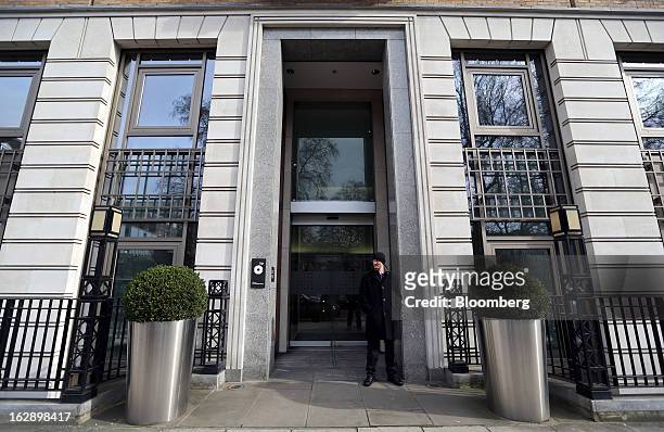 Security guard stands outside the BP Plc headquarters in St. James's Square in London, U.K., on Thursday, Feb. 28, 2013. BP Plc's push to maximize...
