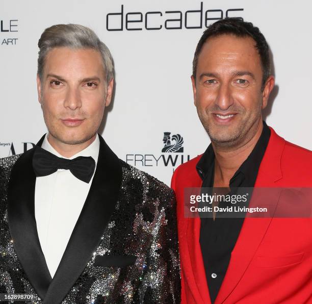 Decades owners Cameron Silver and Christos Garkinos attend the Harper's BAZAAR celebration of Cameron Silver and Christos Garkinos of Decades new...