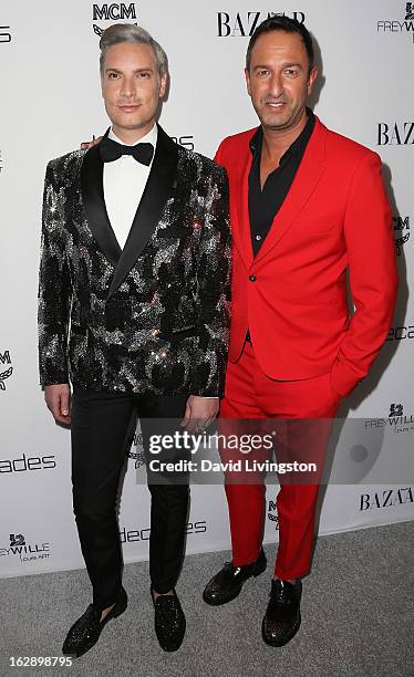 Decades owners Cameron Silver and Christos Garkinos attend the Harper's BAZAAR celebration of Cameron Silver and Christos Garkinos of Decades new...