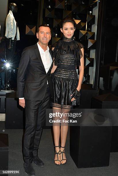 Pier Paolo Righi and Zhang Zilin attend the opening of the Karl Lagerfeld concept store during Paris Fashion Week Fall/Winter 2013 at Karl Lagerfeld...