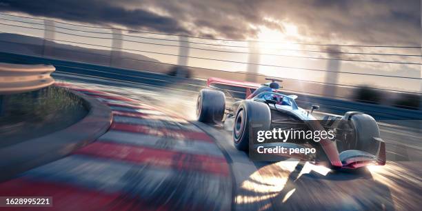 racing car moving fast around corner bend - a blue car driving in speed stock pictures, royalty-free photos & images