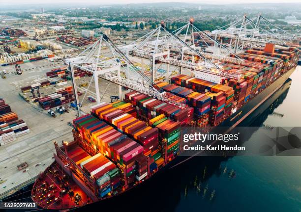 an aerial view of uk shipping and docks - shipping stock pictures, royalty-free photos & images