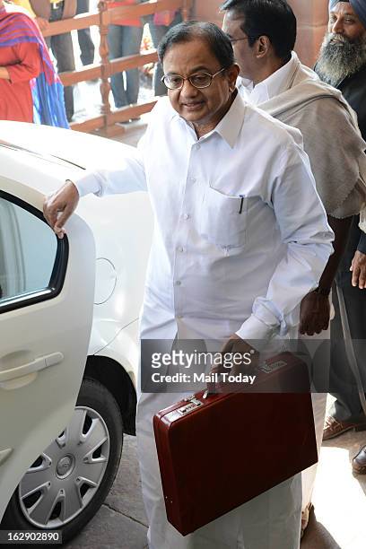 Union Finance Minister P. Chidambaram with Ministers of State for Finance SS Palanimanickam arrive in Parliament House to present the Annual Budget...