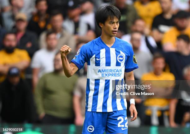 Kaoru Mitoma of Brighton & Hove Albion celebrates after scoring the team's first goal during the Premier League match between Wolverhampton Wanderers...