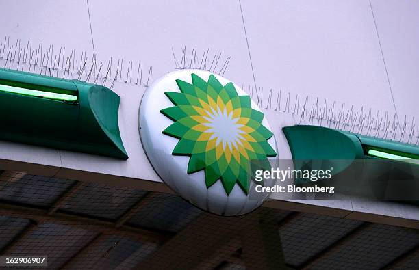 Logo sits on the side of a roof at a BP gas station, operated by BP Plc, in Upminster, U.K., on Thursday, Feb. 28, 2013. BP Plc's push to maximize...