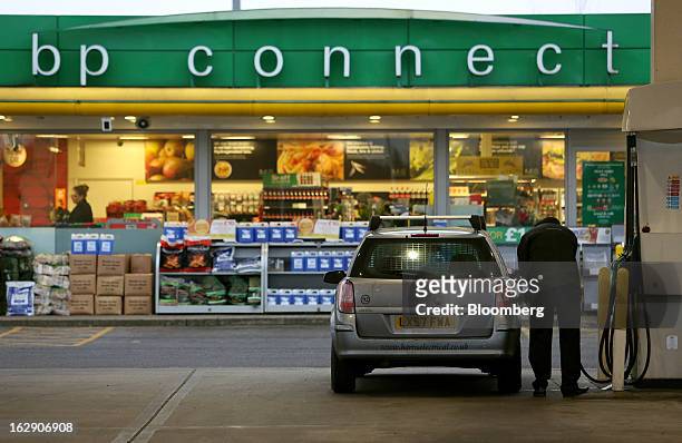 Motorist refuels their automobile with fuel at a BP gas station, operated by BP Plc, in Upminster, U.K., on Thursday, Feb. 28, 2013. BP Plc's push to...
