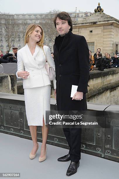 Natalia Vodianova and companion Antoine Arnault arrive to atttend the Christian Dior Fall/Winter 2013 Ready-to-Wear show as part of Paris Fashion...