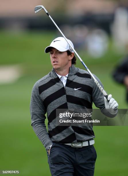 World number one and defending champion, Rory McIlroy of Northern Ireland walks off the course on the 18th hole, his nineth during the second round...