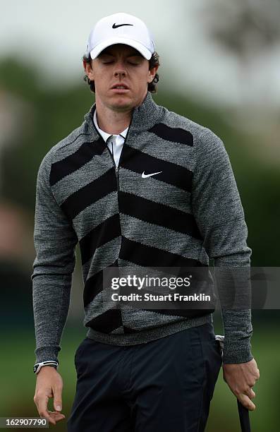 World number one and defending champion, Rory McIlroy of Northern Ireland looks dejected on the 16th hole where he took a triple bogey seven during...