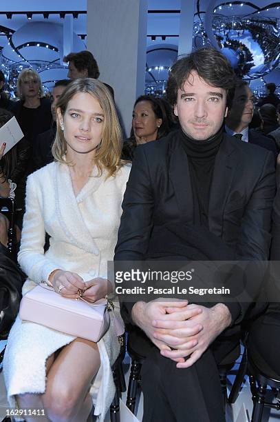 Natalia Vodianova and companion Antoine Arnault attend the Christian Dior Fall/Winter 2013 Ready-to-Wear show as part of Paris Fashion Week on March...