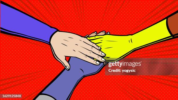 vector pop art superheroes stacking hands together stock illustration - superhero stock illustrations