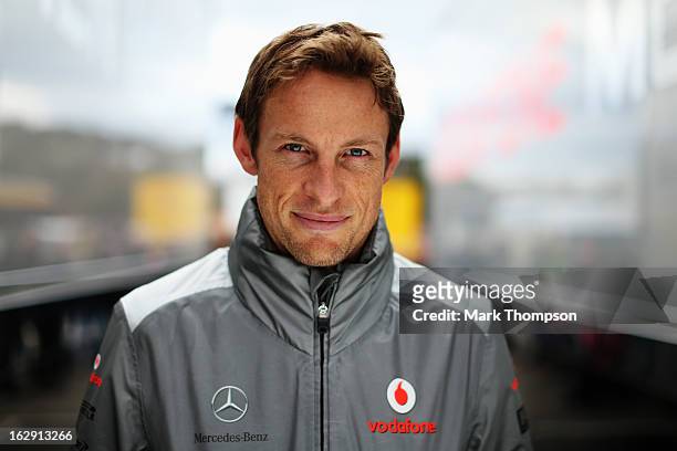Jenson Button of Great Britain and McLaren poses for a photograph during day two of Formula One winter testing at the Circuit de Catalunya on March...