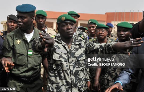 Malian military junta leader Amadou Sanogo arrives at Bamako airport on March 29, 2012 in Bamako. A bid by west African leaders to seek a return to...