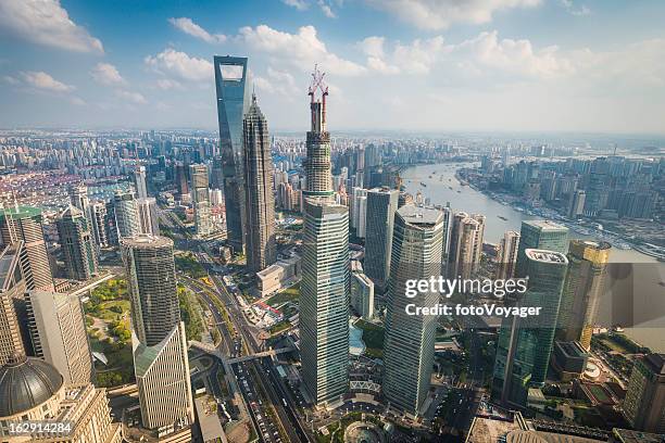 shanghai pudong skyscrapers futuristic cityscape china - people shanghai stockfoto's en -beelden