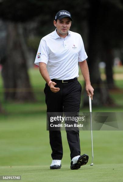 Marcelo Rozo of Colombia reacts to his birdie putt attempt on the ...